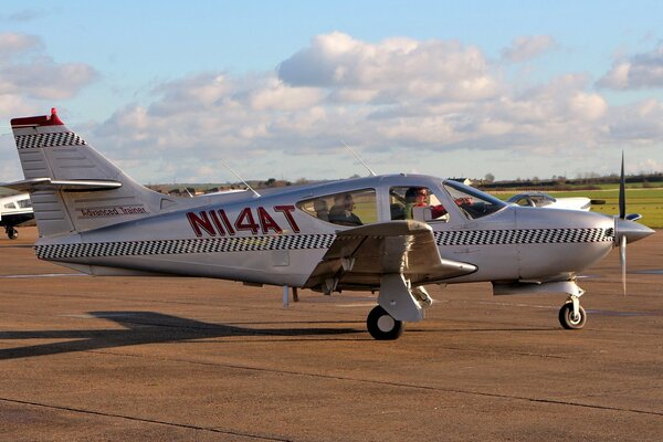 American light monoplane aircraft on the runway Commander 114B 