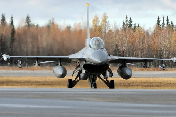 The f-16 fighter plane takes off