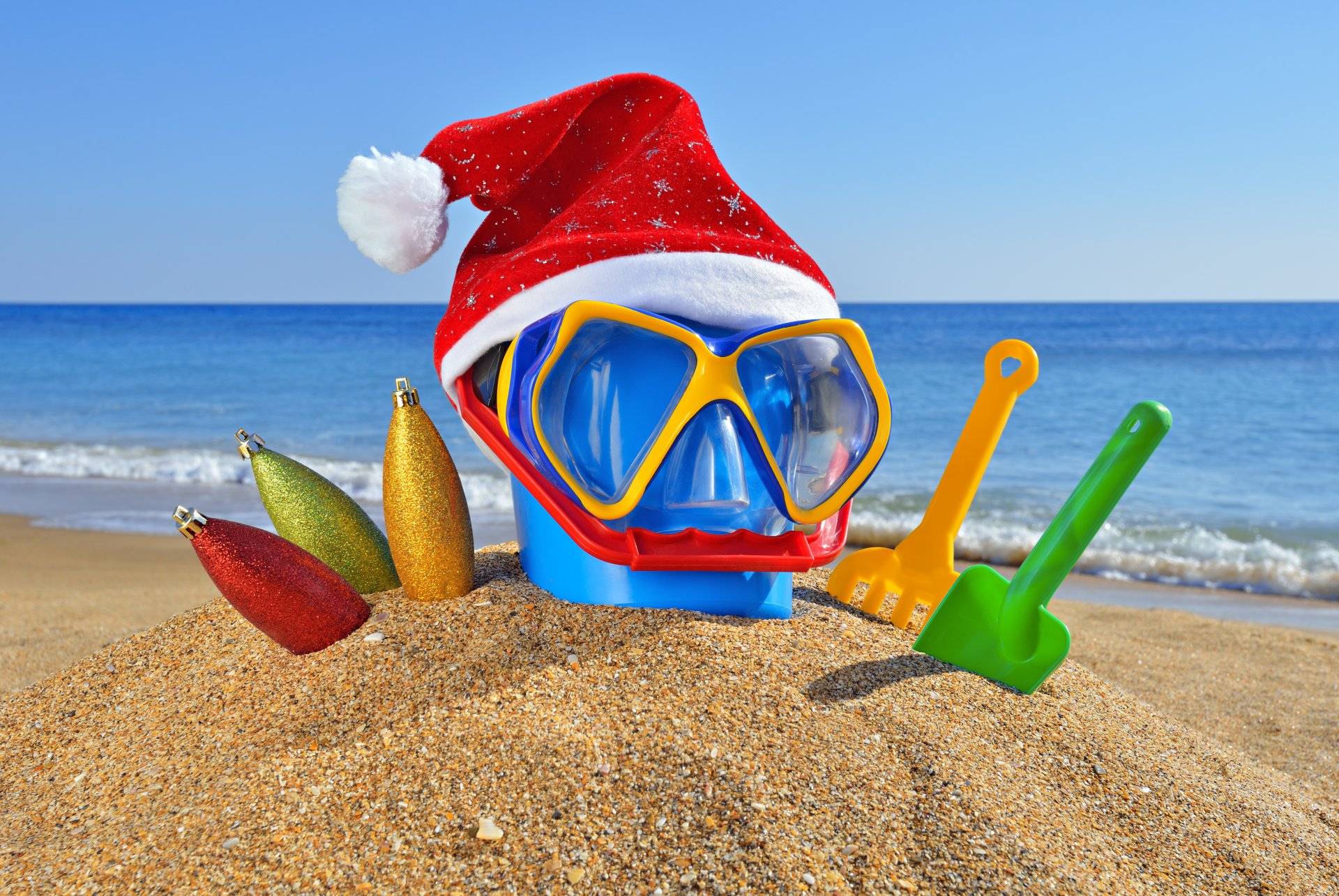 natale capodanno vacanza cappello paletta sabbia mare oceano spiaggia rastrello secchio occhiali giocattoli