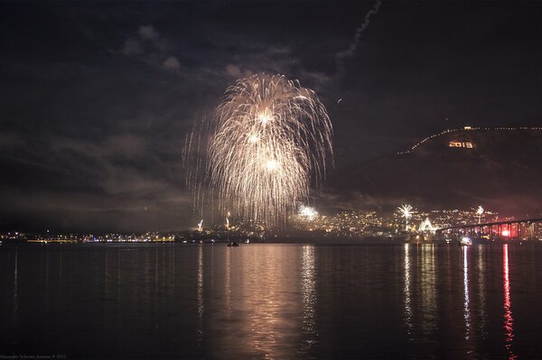 Fireworks over the river for the New Year 2013