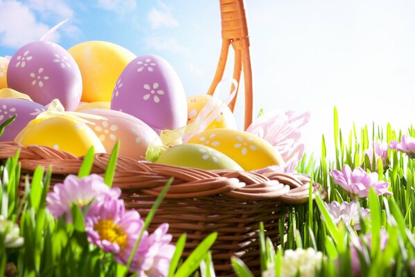 Easter eggs are in a wicker basket