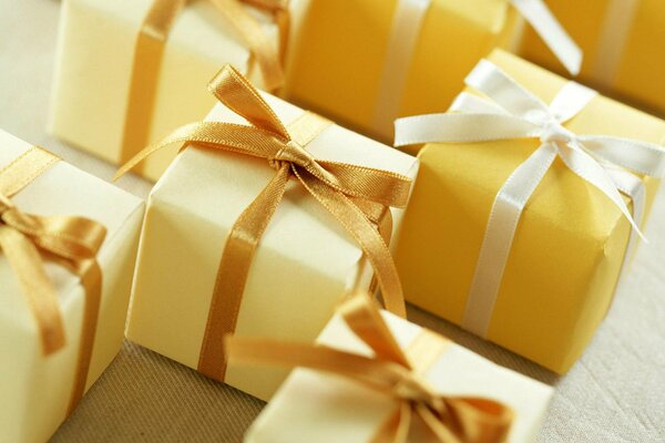 Small gift boxes with ribbons