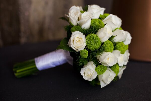 Bride s bouquet of roses and greenery