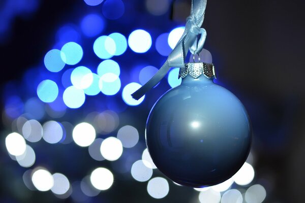 A ball with a ribbon on a bokeh background