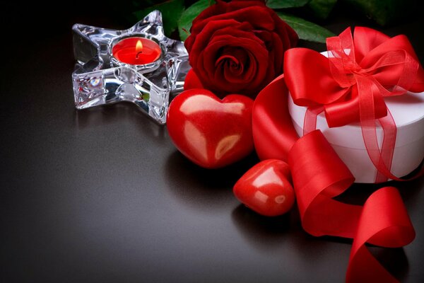 Romantic photo with roses, heart, gift