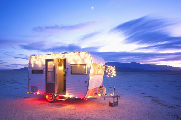 Romantic trailer on the background of the desert