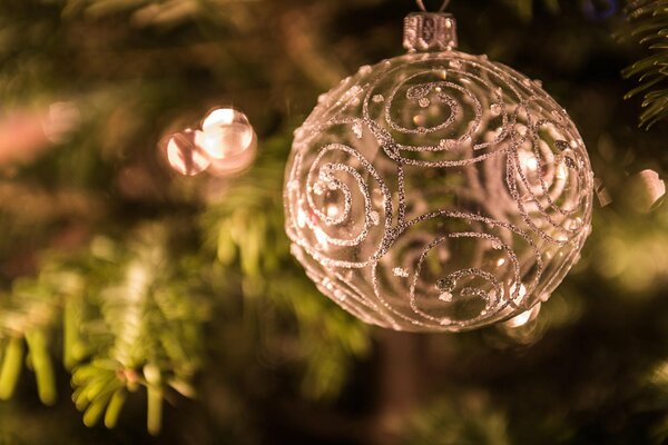 Transparent ball with gold ornament