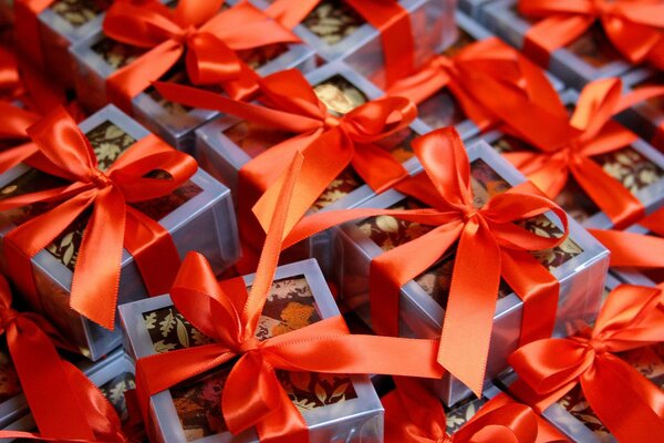 Blue gift boxes with red letochki