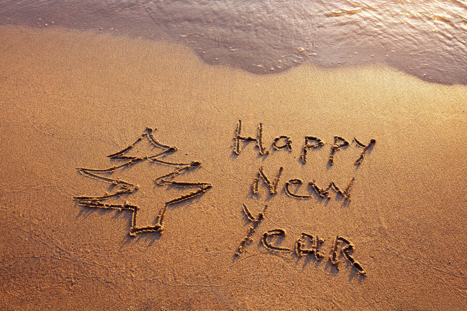 felice anno nuovo spiaggia sabbia mare felice anno nuovo