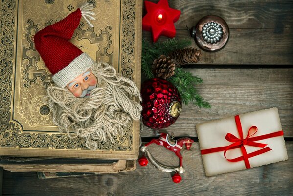 A book with Santa Claus and gifts