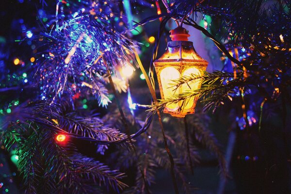 Christmas tree with tinsel and bright garland