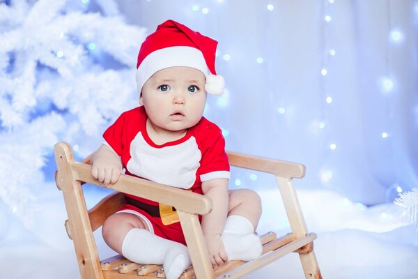 Photo a child in a New Year s hat