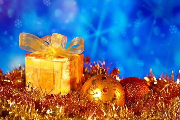 Bright yellow gift and Christmas decorations