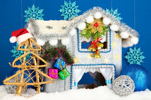 Beautiful Christmas house on a blue background