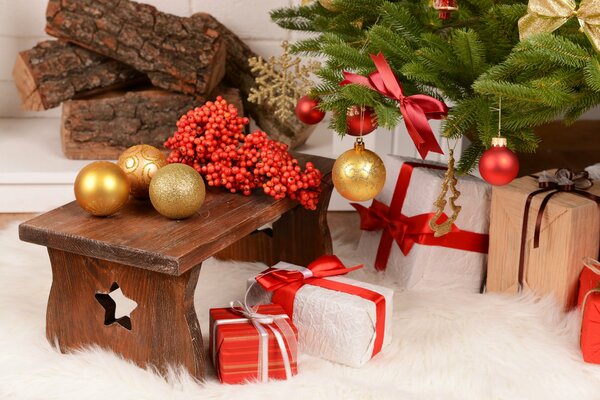 New Year s gifts under a decorated Christmas tree