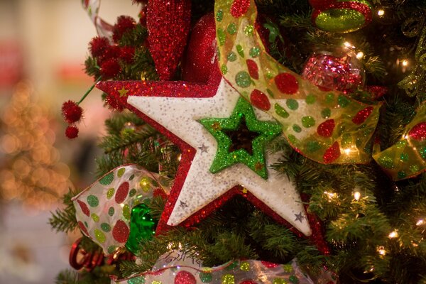 Decoración del árbol de Navidad en forma de estrella con cintas