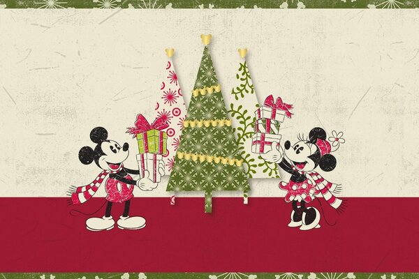 Mickey mouse y Minnie en el árbol de Navidad con regalos