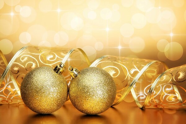 Bright golden balls and ribbon