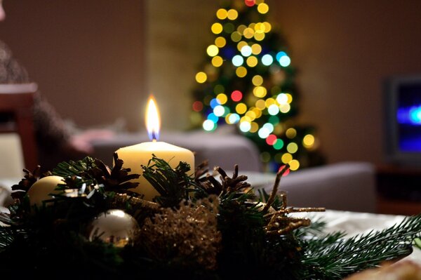 Christmas preparations - candles and a Christmas tree