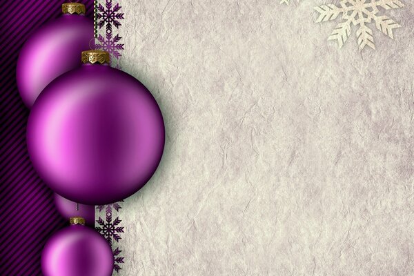 Purple balloons and paper with snowflakes