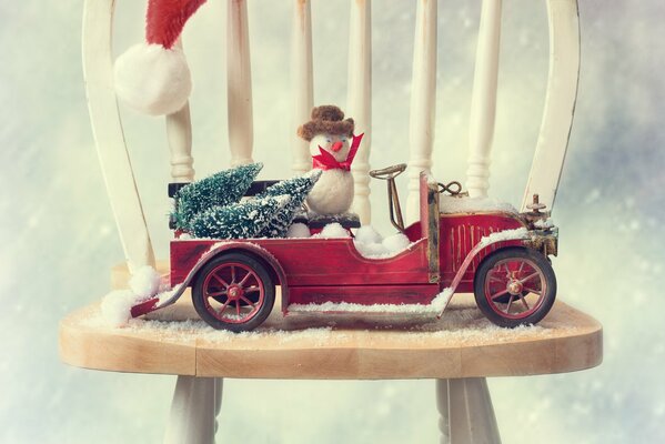 Muñeco de nieve viaja en coche-decoración de Navidad