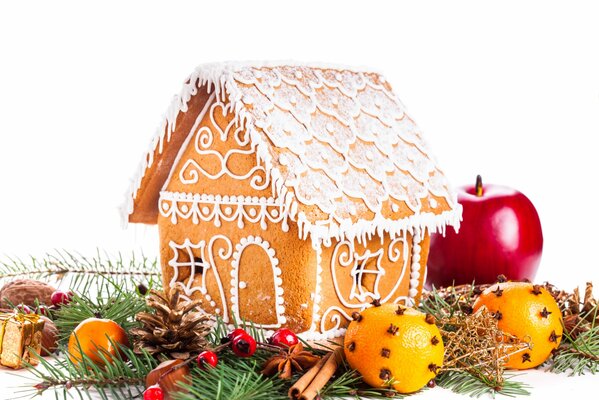 Gingerbread house. Orange and apple