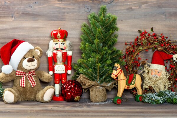 Toys, a small Christmas tree and a wreath for decoration for the New Year