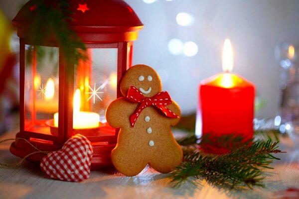 Linterna con vela y galletas, en forma de muñeco de nieve para el año Nuevo