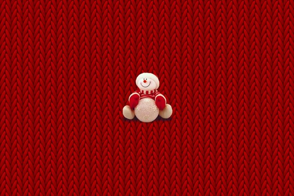 Schneemann im Neujahrs-Pullover