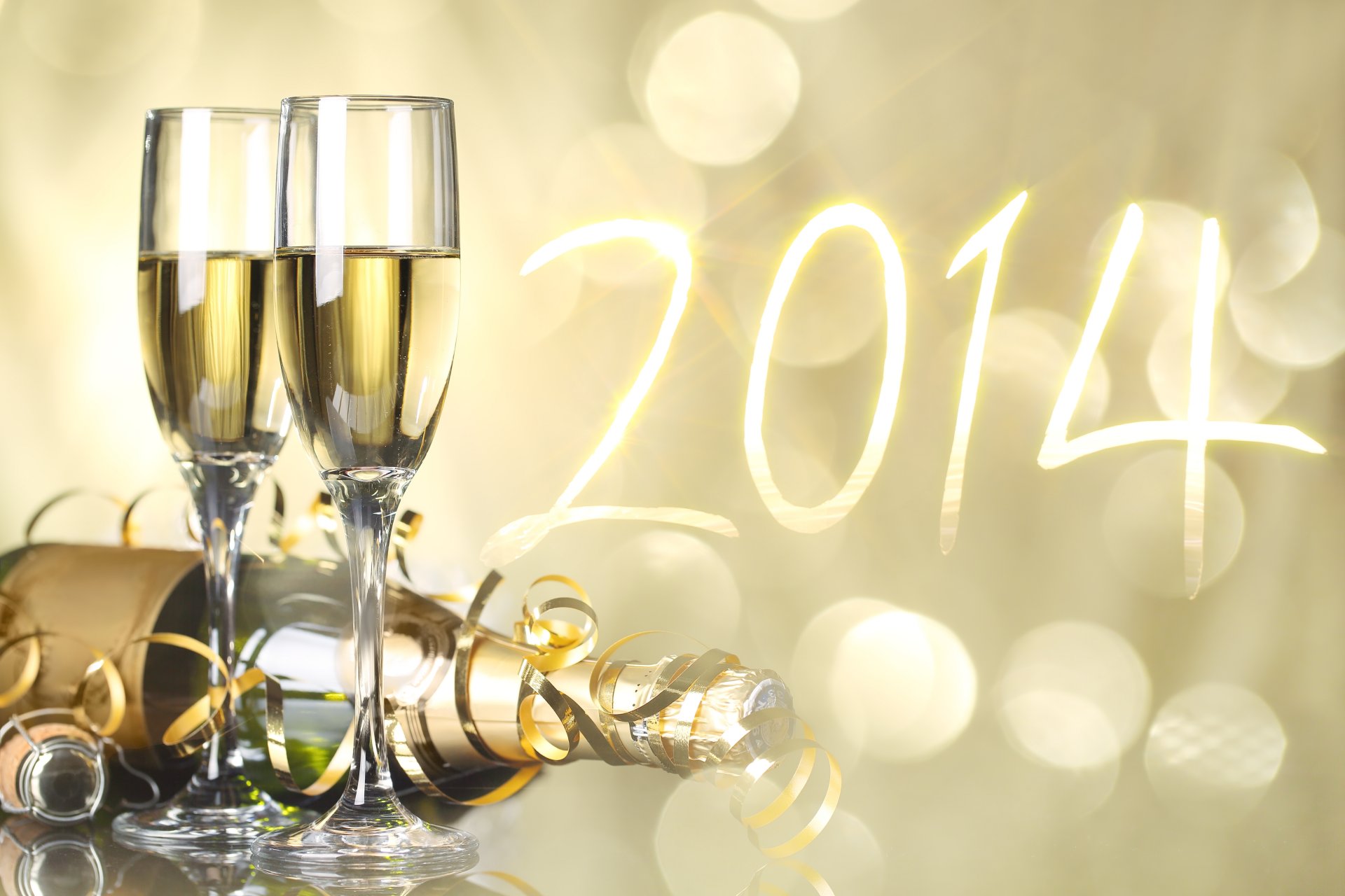 holiday new year glasses a bottle champagne 2014 bokeh serpentine number