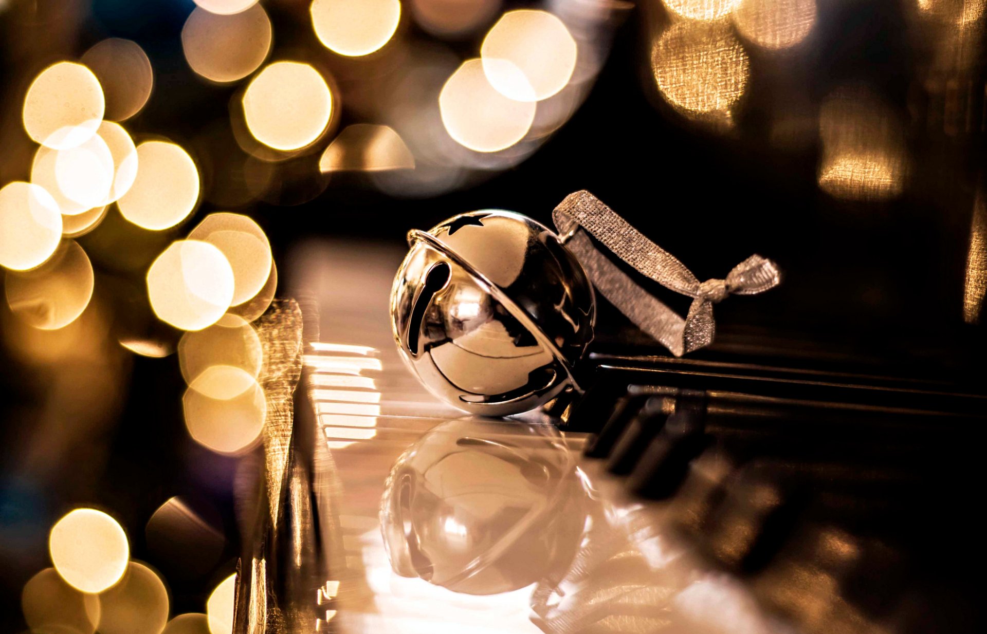 golden piano bokeh new year christmas holiday bulbs decoration