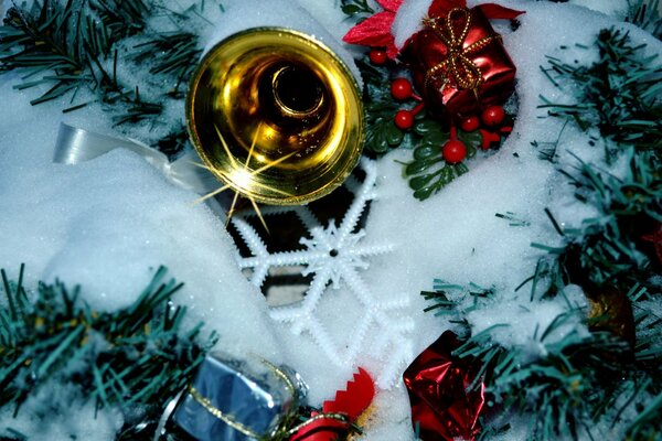 Bells and snowflakes in the snow