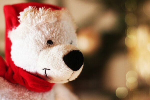 Teddy bear with a red scarf