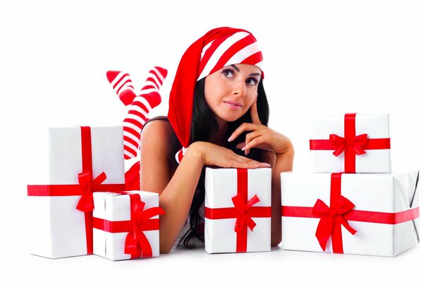 Photo shoot of a girl in the new year with gifts