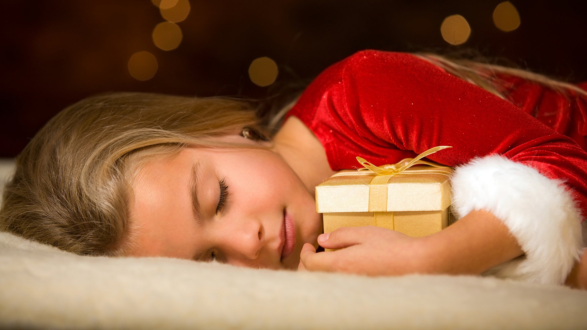 girl present sleeping holiday