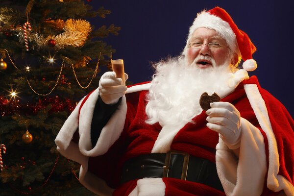 Classic Santa with a Christmas tree and a glass