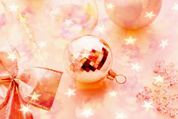 Sequins on the ball together with a star and a red ribbon