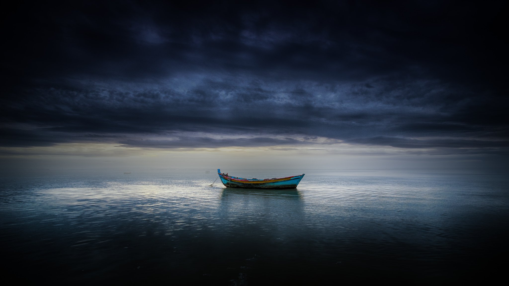 boat sea clouds horizon gray clouds storm