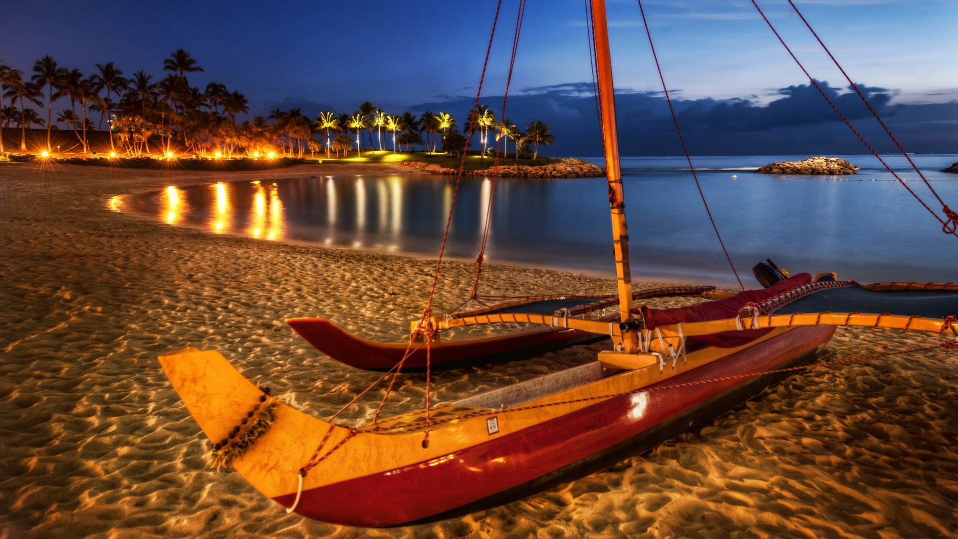 cielo notte mare luci riva palme barca hdr