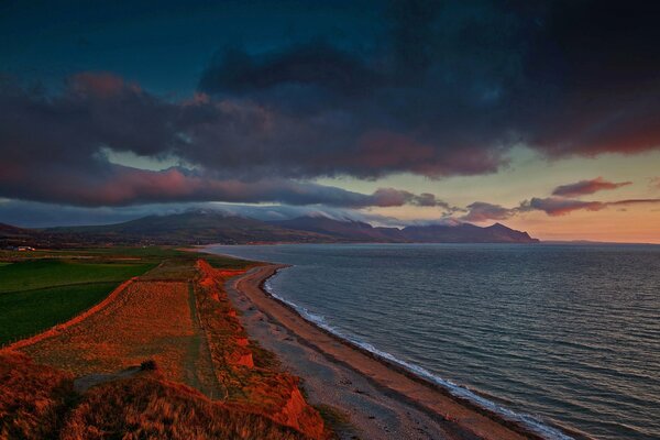 Sea coast against the background of mountains