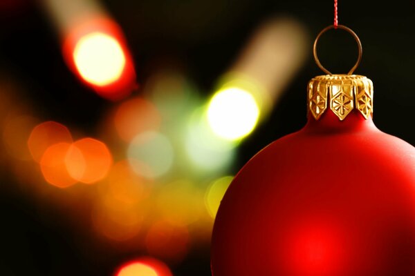 Toy balloon on the Christmas tree in the New Year