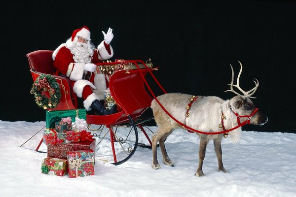 Babbo Natale e cervi di Natale