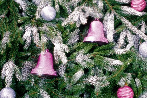 A Christmas tree filled with toys and bells