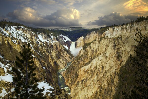 View from the gorge of the mountains to the waterfall