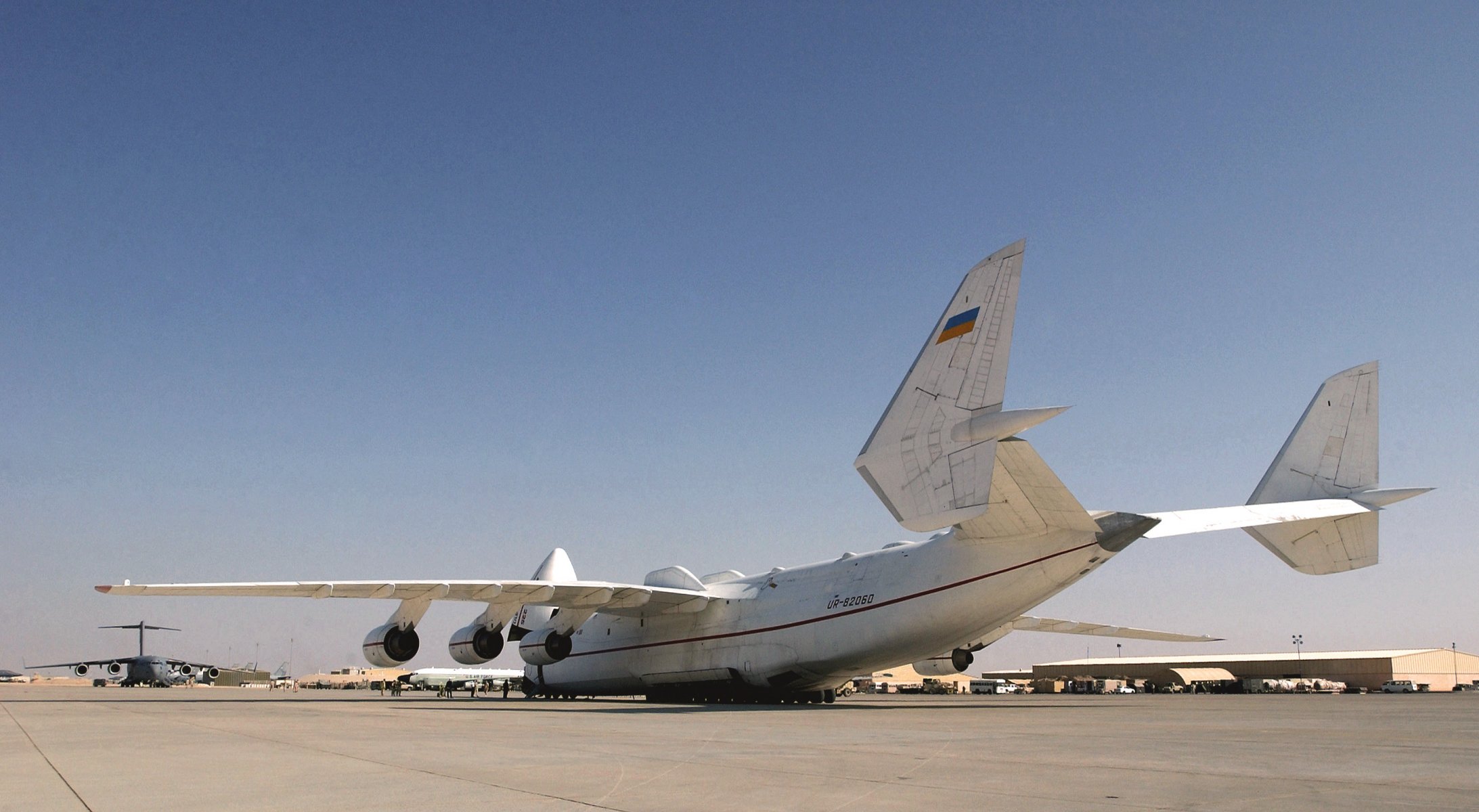 antonov an225 en-225 mriya kazak plane trucks wings jet aviation white