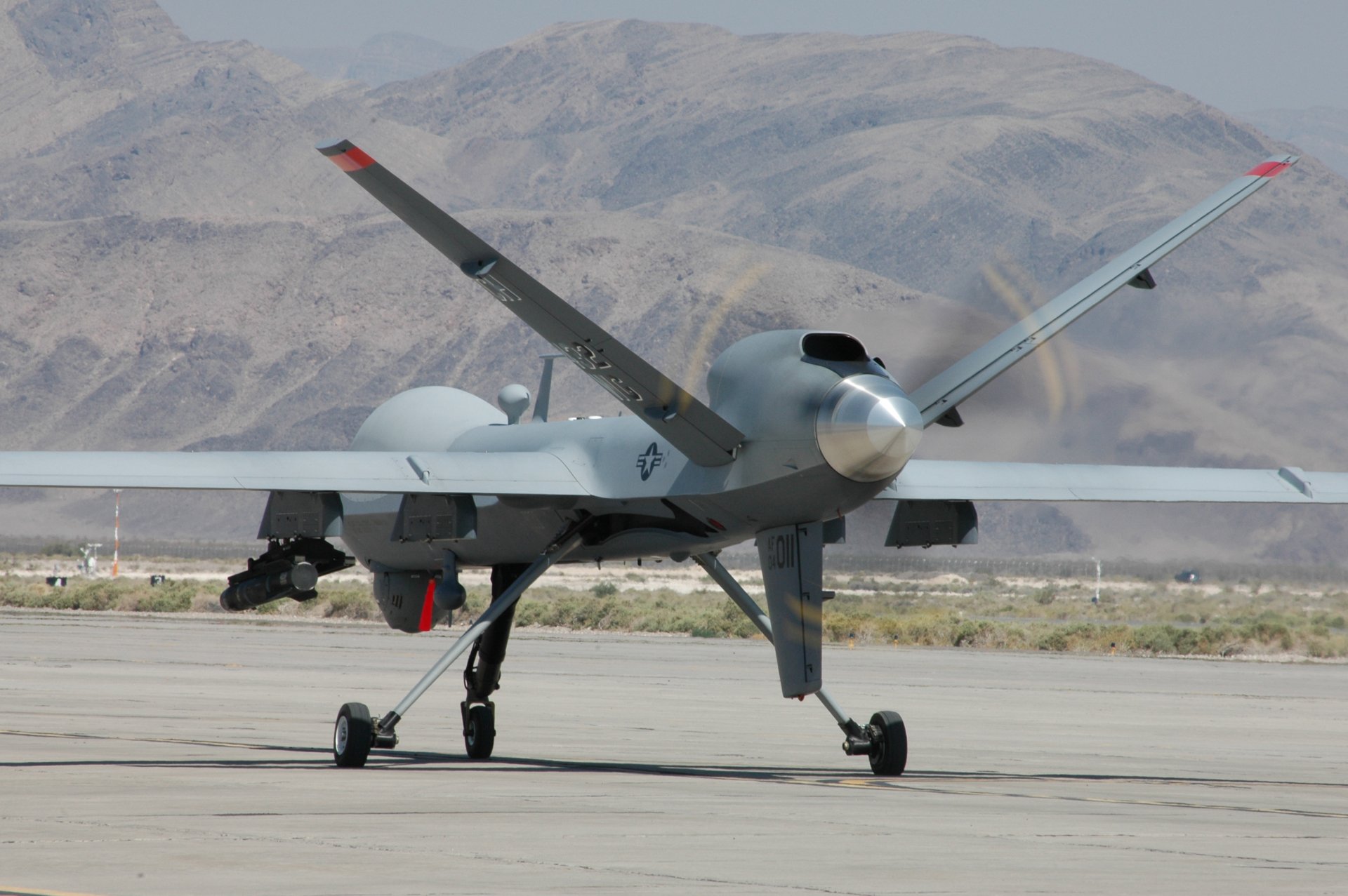 united states air force uav mq-9 reaper rocket mountain off