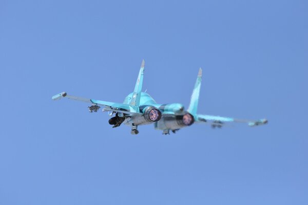 The Su-34 bomber takes off. Rear view