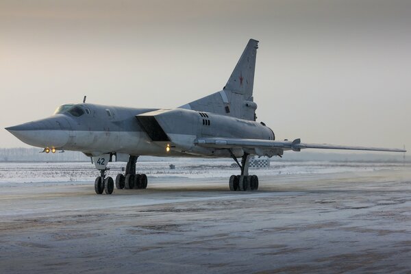 The TU-22m supersonic aircraft stands on the runway