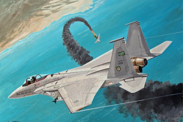 The f-15 military fighter is conducting a dogfight in the sky