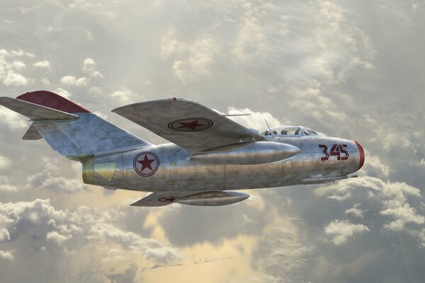 Avion de chasse vole dans le ciel au-dessus des nuages